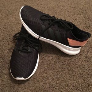 Black adidas tennis shoes